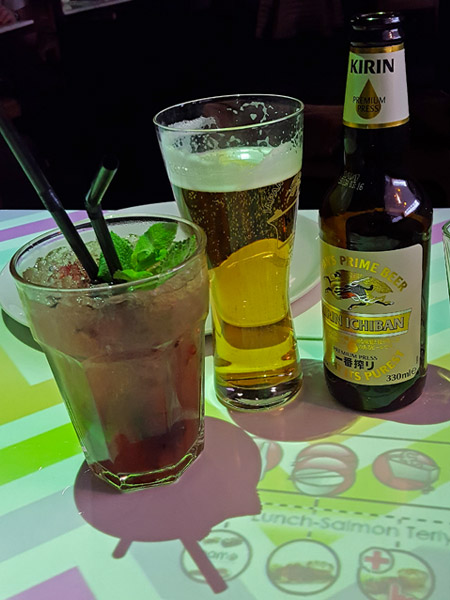 Cocktail and beer on the interactive tables at Japanese/Korean restaurant, Inamo in Soho, London