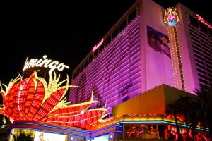 Bright lights of the fabulously pink Flamingo Hotel on the Las Vegas strip.