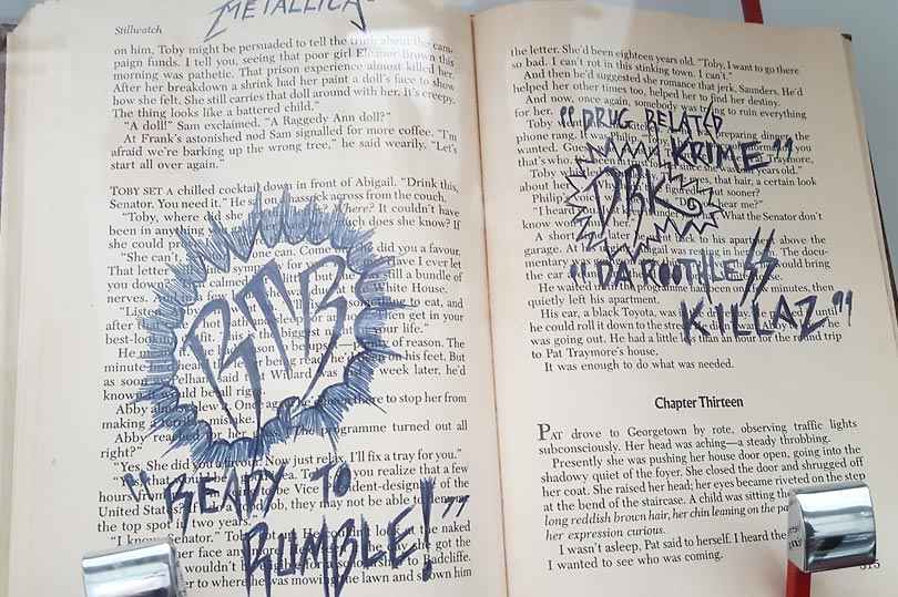 Book defaced by an inmate at Addington Jail